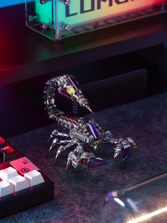 Metallic scorpion figurine on a dark surface with colorful lighting in the background