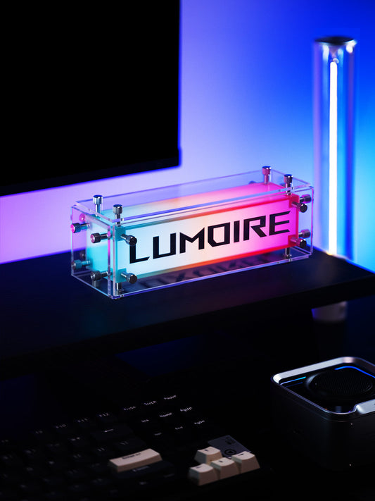LUMOIRE LED light strip on a desk with a computer setup in the background