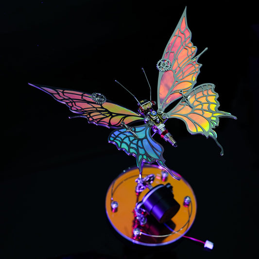 Colorful butterfly-shaped object with intricate design on a black background