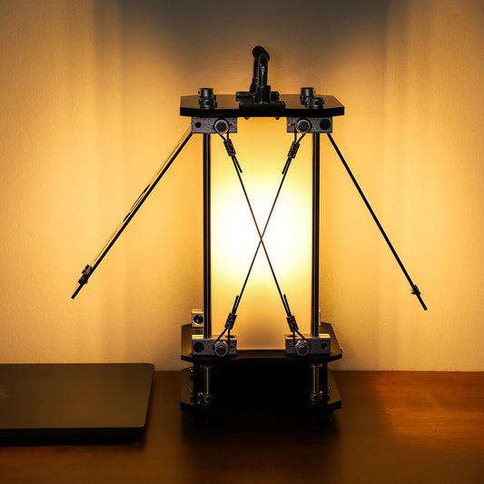 Mechanical device on a wooden surface with a warm glow